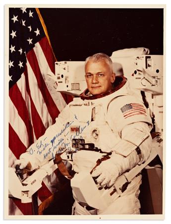 (ASTRONAUTS.) MCCANDLESS II, BRUCE. Two color Photographs Signed and Inscribed, each half-length portraits by NASA showing him in profi